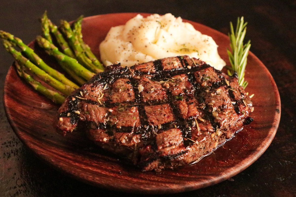 http://www.gamekeepermeats.com/cdn/shop/products/GarlicHerbBisonRibeye2_1200x1200.jpg?v=1663621689